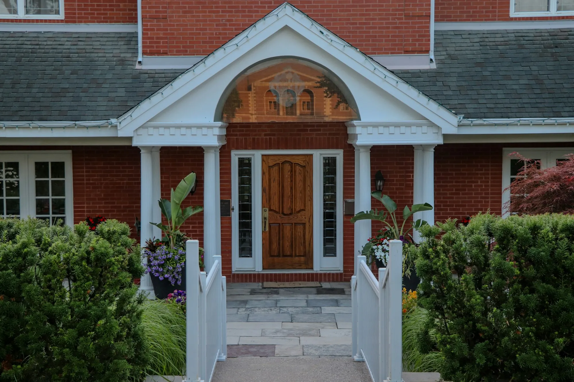 The front entrance of a brick house