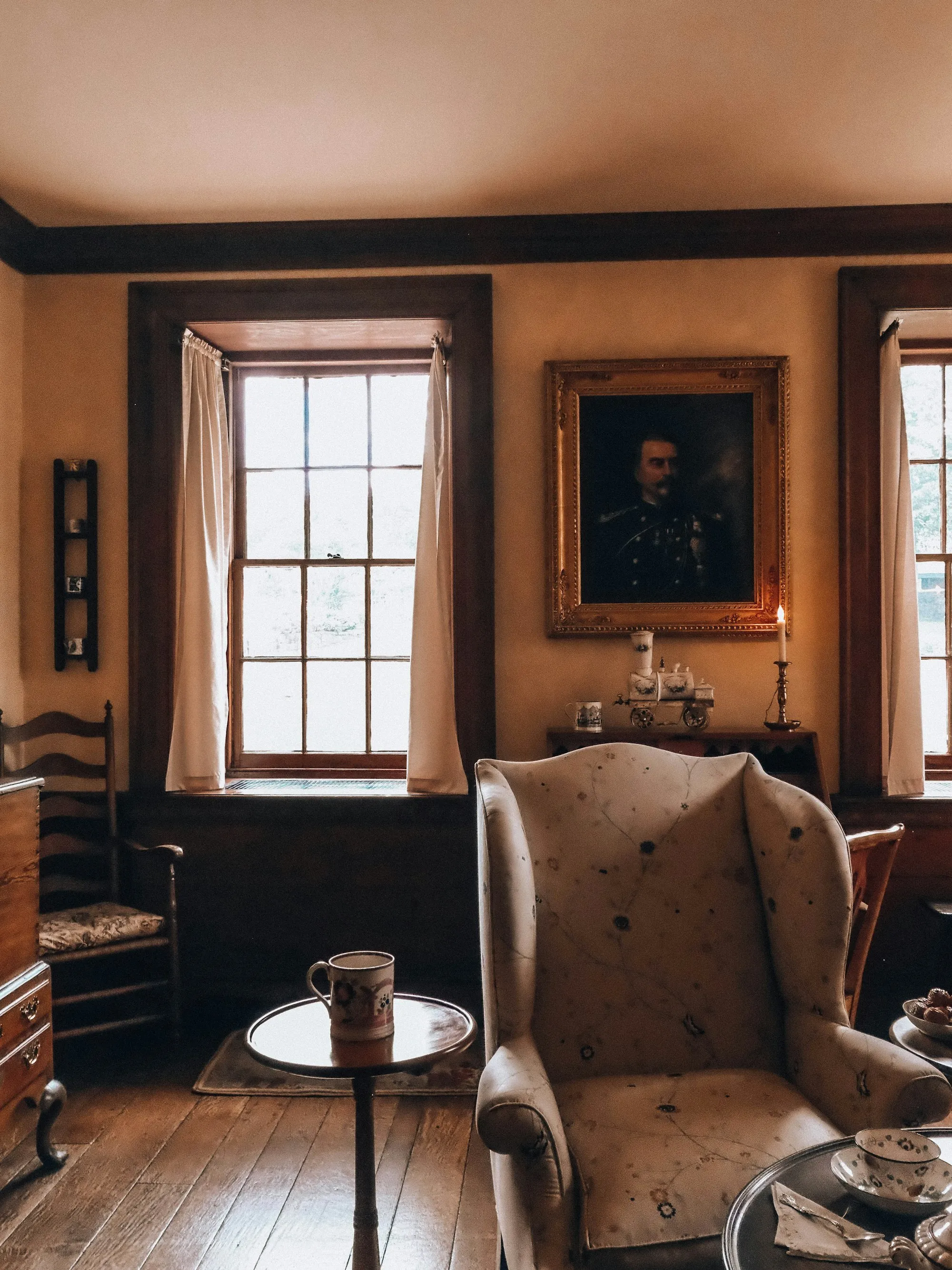 A quiet room with an armchair and a window